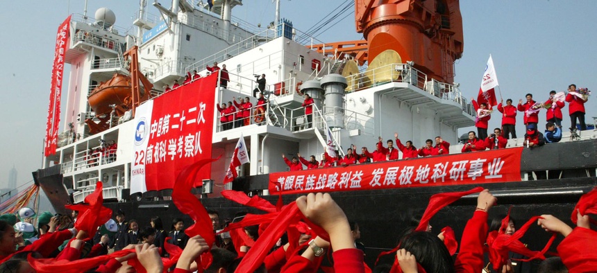 Students waves to members of the Chinese Antarctica Research Team aboard the polar expedition ship Xuelong as they leave Shanghai in east China Friday, Nov. 18, 2005.