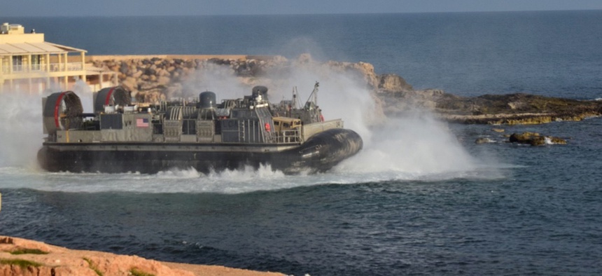 A U.S. amphibious hovercraft departs with evacuees from Janzur, west of Tripoli, Libya, Sunday, April 7, 2019.