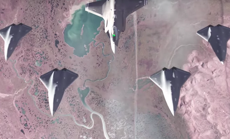 A still from an Air Force Research Lab video depicting the Loyal Wingman program, an F-35 surrounded by intelligent air combat drones. A still from an Air Force Research Lab video depicting the Loyal Wingman program, an F-35 surrounded by intelligent air combat drones.