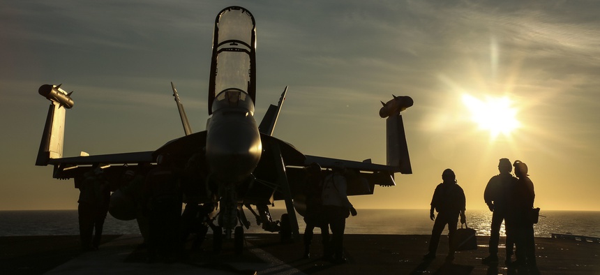 Sailors on the flight deck of the Nimitz-class aircraft carrier USS Abraham Lincoln (CVN 72), April 14, 2019 in the Mediterranean Sea.