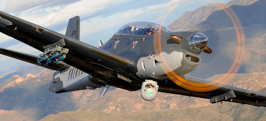 An MX-15D sensor ball by L3 Wescam, mounted on an Embraer Super Tucano.