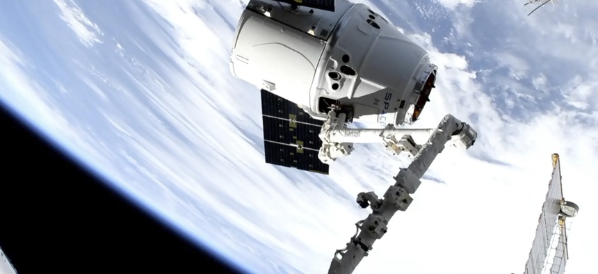 In this image taken from NASA Television, a SpaceX shipment arrives at the International Space Station following a weekend launch, Monday, May 6, 2019. The Dragon capsule reached the orbiting complex Monday, delivering 5,500 pounds (2,500 kilograms)