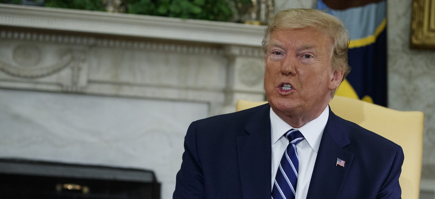 President Donald Trump speaks during a meeting with Canadian Prime Minister Justin Trudeau in the Oval Office of the White House, Thursday, June 20, 2019, in Washington.