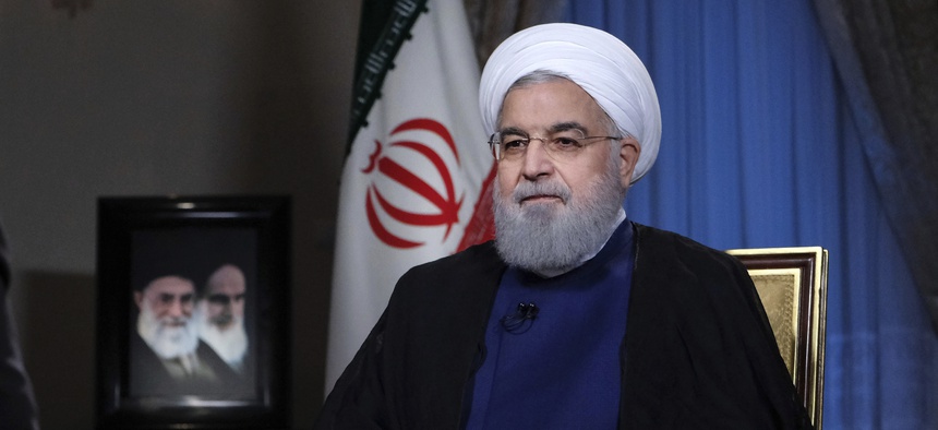 In this photo released by official website of the office of the Iranian Presidency, President Hassan Rouhani addresses the nation in a televised speech in Tehran, Iran, Monday Aug. 6, 2018