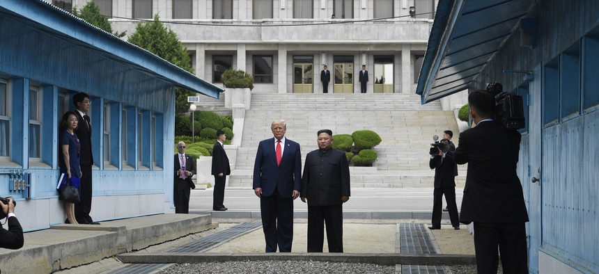 President Donald Trump meets with North Korean leader Kim Jong Un at the border village of Panmunjom in the Demilitarized Zone, South Korea, Sunday, June 30, 2019.