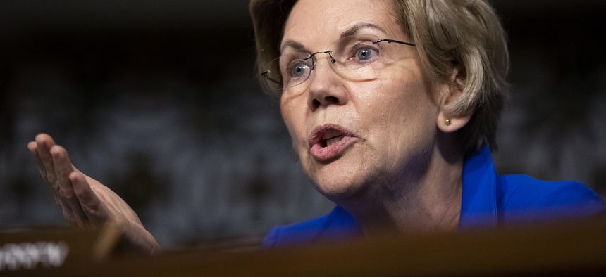 Senate Armed Services Committee member Sen. Elizabeth Warren, D-Mass., questions Secretary of the Army and Secretary of Defense nominee Mark Esper during his confirmation hearing on Capitol Hill in Washington, Tuesday, July 16, 2019.
