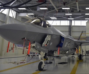 Airmen 1st Class Griffin Smith and William Manion, both 33rd Maintenance Squadron aircraft fuels system repairman apprentices, don safety gear to prepare an F-35A Lightning II for maintenance at Eglin Air Force Base, Fla., Jan. 13, 2016. 