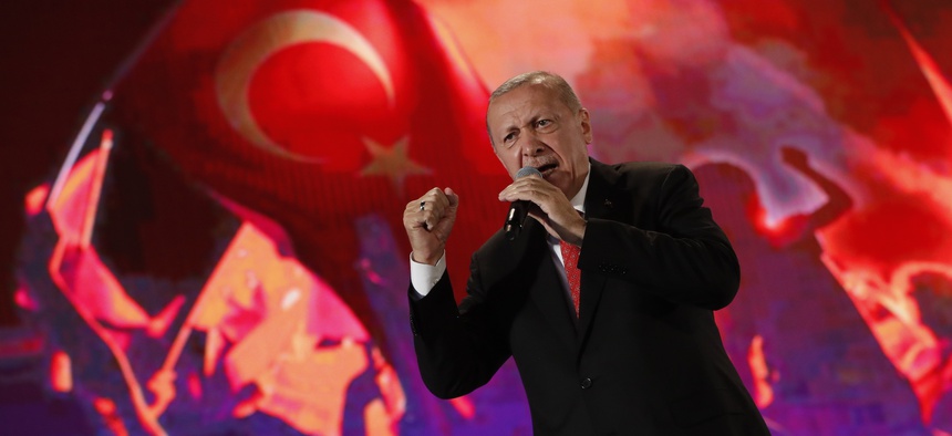 Turkey's President Recep Tayyip Erdogan delivers a speech at a rally to honour the victims of the July 15, 2016 failed coup attempt, in Istanbul, Monday, July 15, 2019.