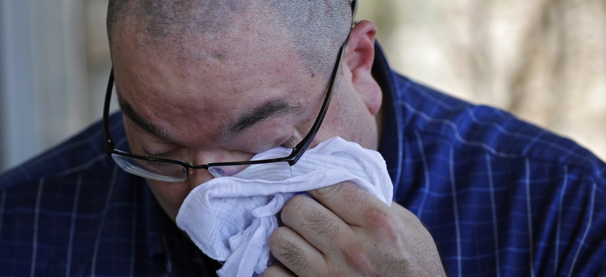 Paul Jamrowski wipes away tears as he speaks with the media about the death of his daughter at University Medical Center of El Paso, Sunday, Aug. 4, 2019, in El Paso, Texas.