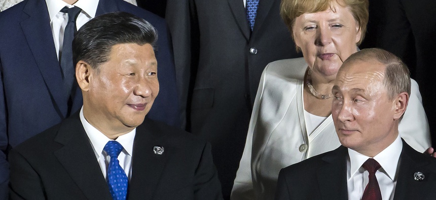 China's President Xi Jinping, left, and Russia's President Vladimir Putin, at the G-20 summit on Friday, June 28, 2019, in Osaka, Japan.