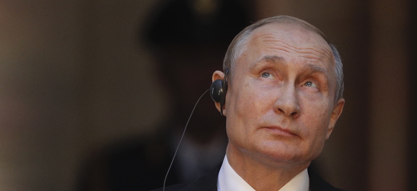 Russian President Vladimir Putin holds a joint press conference at the Chigi palace with Italian Premier Giuseppe Conte (not in picture) after their meeting, in Rome, Thursday, July 4, 2019.