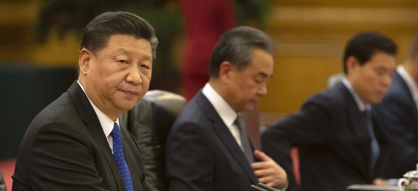 Chinese President Xi Jinping sits during a meeting with Turkish President Recep Tayyip Erdogan at the Great Hall of the People in Beijing, Tuesday, July 2, 2019.