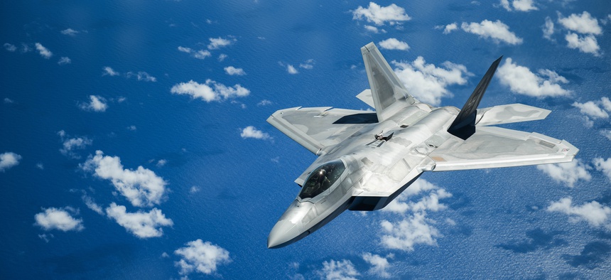 A United States Air Force F-22 Raptor from Joint Base Pearl Harbor-Hickam in Honolulu, Hawaii, flies over the Pacific Ocean during the Sentry Aloha exercise at Joint Base Pearl Harbor-Hickam, August 27, 2019. Aircraft from around the world took part.
