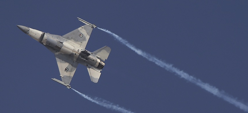 A UAE F-16 fighter jet performs during the 2017 Dubai Air Show.