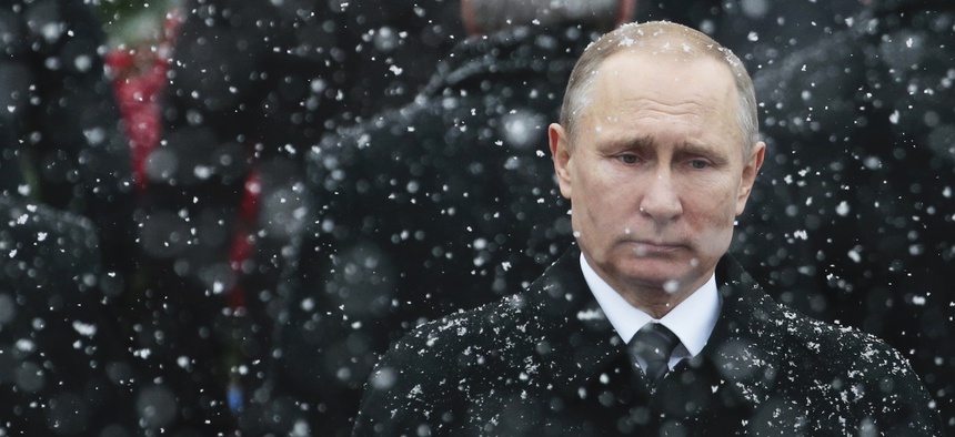 In this file photo taken on Thursday, Feb. 23, 2017, Russian President Vladimir Putin attends a wreath-laying ceremony at the Tomb of the Unknown Soldier in Moscow, Russia.