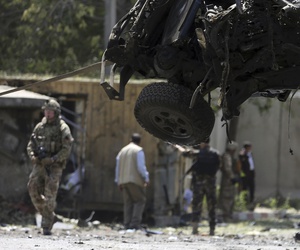 Resolute Support (RS) forces remove a destroyed vehicle after a car bomb explosion in Kabul, Afghanistan, Thursday, Sept. 5, 2019. Resolute Support (RS) forces remove a destroyed vehicle after a car bomb explosion in Kabul, Afghanistan, Thursday, Sept. 5, 2019.