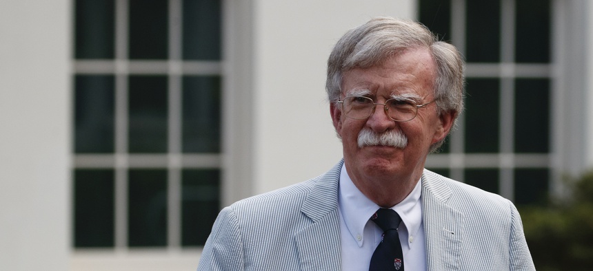 National security adviser John Bolton walks to speak to media at the White House in Washington, Wednesday, July 31, 2019.National security adviser John Bolton walks to speak to media at the White House in Washington, Wednesday, July 31, 2019.