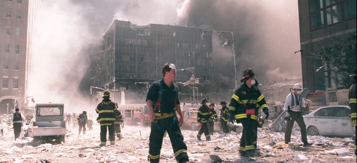 New York City firefighters work near the area known as Ground Zero after the collapse of the Twin Towers September 11, 2001 in New York City.
