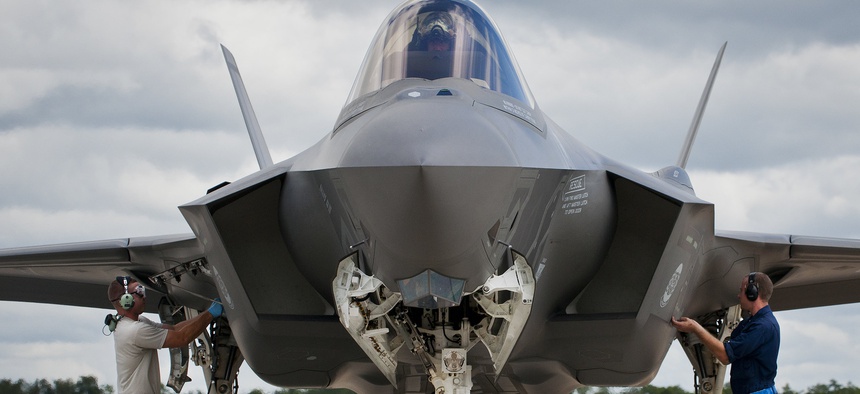 Airmen from the 33rd Maintenance Group perform checks on an F-35A Lightning II prior to a hot pit refueling session at Eglin Air Force Base, Florida.