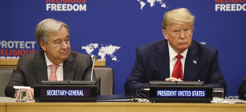 President Donald Trump listens at an event on religious freedom during the United Nations General Assembly, Monday, Sept. 23, 2019, in New York, with UN Secretary General António Guterres, left.
