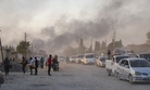 Syrians flee shelling by Turkish forces in Ras al Ayn, northeast Syria, Wednesday, Oct. 9, 2019.