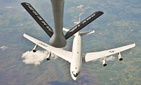 An E-8C Joint Surveillance Target Attack Radar System aircraft approaches the boom of a KC-135R Stratotanker assigned to the 128th Air Refueling Wing, Wisconsin Air National Guard, April 20, 2016.