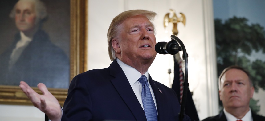 President Donald Trump, with Secretary of State Mike Pompeo, speaks on Syria conflict, Wednesday, Oct. 23, 2019