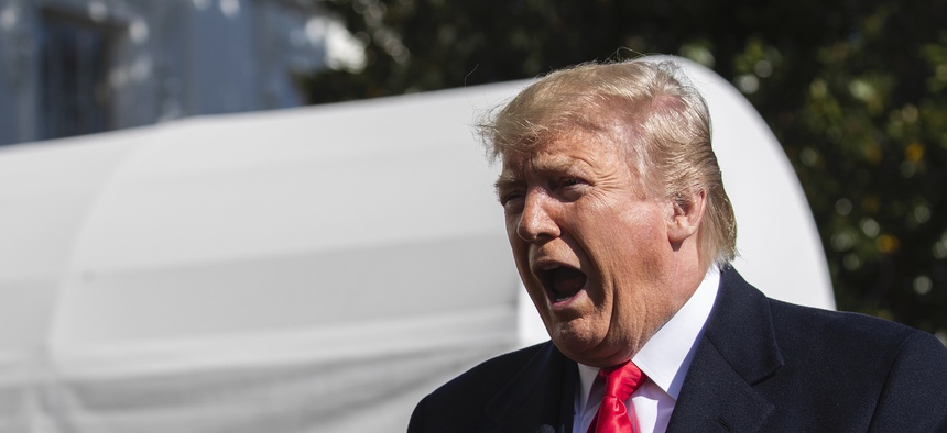 President Donald Trump speaks to reporters upon arrival at the White House in Washington, Sunday, Nov. 3, 2019.