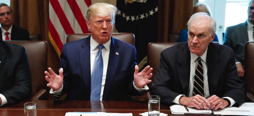 President Donald Trump speaks during a July 2019 Cabinet meeting in the Cabinet Room of the White House. Right, then-Acting Secretary of Defense Richard Spencer.
