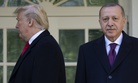 President Donald Trump walks off toward the Oval Office after posing for photographers with Turkish President Recep Tayyip Erdogan before a meeting in the Oval Office of the White House, Wednesday, Nov. 13, 2019.