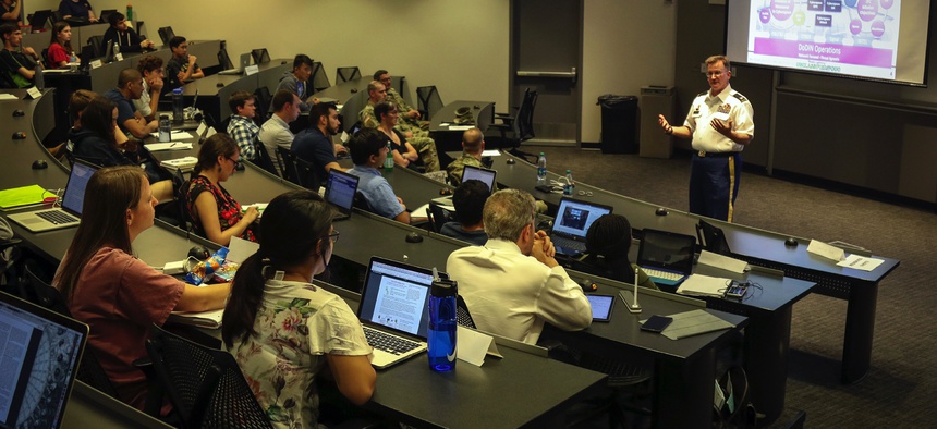 Col. James "Jim" M. Chatfield, cyber director and deputy director of operations for the U.S. Army Reserve's 335th Signal Command (Theater), speaks to graduate students and Army ROTC cadets at Georgia Institute of Technology in 2017.