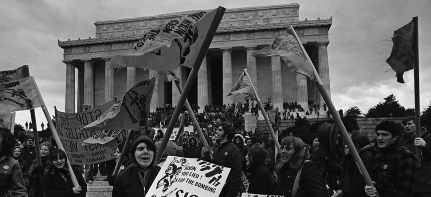 Thousands of antiwar demonstrators mass in front of the Lincoln Memorial in Washington, D.C., Jan. 20, 1973 taking part in a "March Against Death."