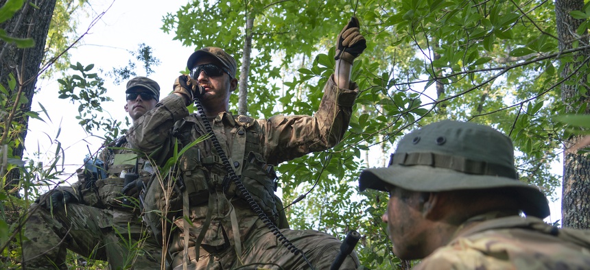 Soldiers with the 1st Battalion, 167th Infantry Regiment, 53rd Infantry Brigade Combat team establish radio communications with their headquarters element during a reconnaissance mission as part of XCTC 19-05, Aug. 8, 2019 at Camp Shelby, MS.