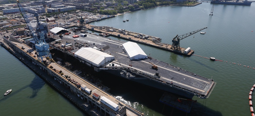 In this April 27, 2016 photo, USS Gerald R. Ford is stationed at Newport News Shipbuilding in Newport News, Va.