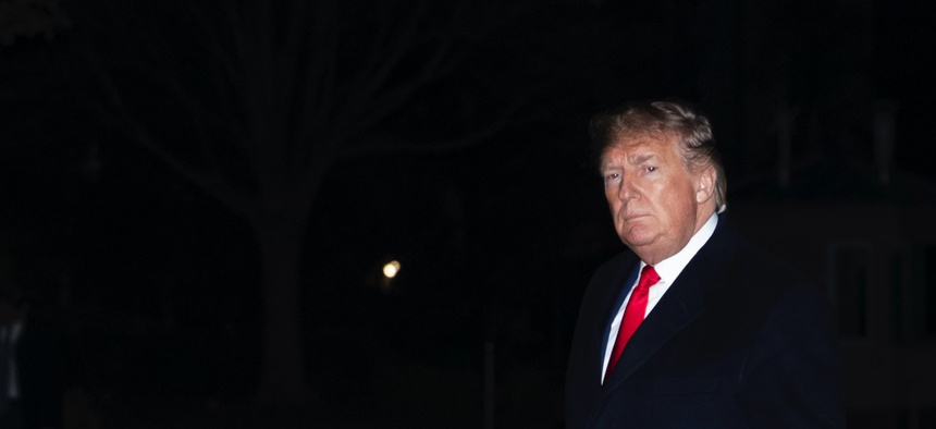 President Donald Trump walks on the South Lawn after stepping off Marine One at the White House, Thursday, Jan. 9, 2020, in Washington.