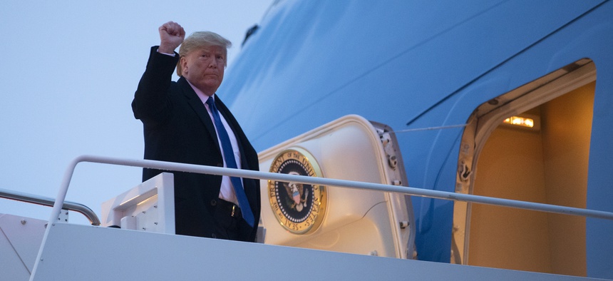 President Donald Trump boards Air Force One for a trip to Milwaukee to attend a campaign rally, Tuesday, Jan. 14, 2020, in Andrews Air Force Base, Md.