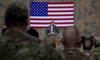 President Donald Trump speaks at a hangar rally at Al Asad Air Base, Iraq, Wednesday, Dec. 26, 2018. President Donald Trump speaks at a hangar rally at Al Asad Air Base, Iraq, Wednesday, Dec. 26, 2018.