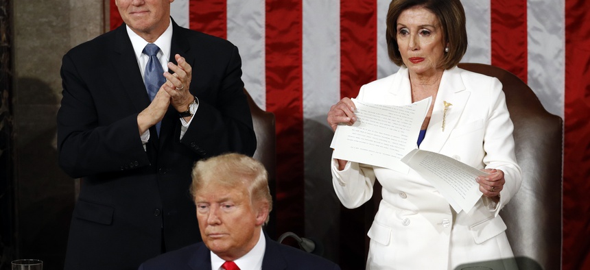 House Speaker Nancy Pelosi of Calif., tears her copy of President Donald Trump's s State of the Union address after he delivered it to a joint session of Congress on Capitol Hill in Washington, Tuesday, Feb. 4, 2020.