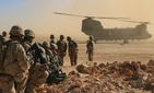 Soldiers assigned to the 1st Squadron, 3rd Cavalry Regiment, await extraction via a CH-47 Chinook during an aerial response force live-fire training exercise, Al Asad Air Base, Iraq, Oct. 31, 2018.