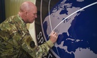 Gen. John Raymond, U.S. Space Force chief of space operations, signs the United States Space Command sign inside of the Perimeter Acquisition Radar building Jan. 10, 2020, on Cavalier Air Force Station, North Dakota.