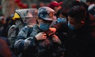 In this photo taken January 24, 2020 and released by Xinhua News Agency, a military medic from the Air Force Medical University prepares to leave for Wuhan from Xi'an, capital of northwestern China's Shaanxi Province.