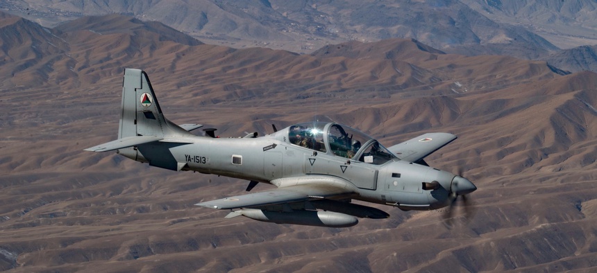 An Afghan pilot conducts training in an A-29 Super Tucano over Kabul, Afghanistan as part of the Train Advise and Assist Command's (TAAC-Air) mission on Dec. 20, 2018.
