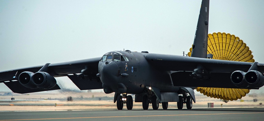 Al Udeid Air Base - An Air Force B-52 Stratofortress aircraft deploys its rear chute after touching down at Al Udeid Air Base, Qatar, April 9, 2016.