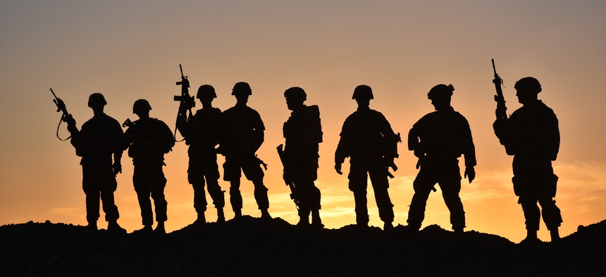 Soldiers from Task Force Stalwart, composed of soldiers from 1st Battalion, 41st Infantry Regiment, 2nd Brigade Combat Team, 4th Infantry Division, pose for a group photo in Afghanistan, March 28, 2018.