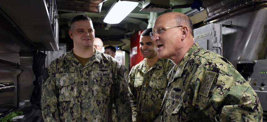 GROTON, Conn. (Feb. 24, 2020) Chief of Naval Operations (CNO) Adm. Mike Gilday speaks with Sailors while they wait in the chow line for lunch aboard the Virginia-class fast-attack submarine USS Colorado (SSN 788).