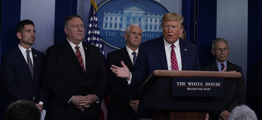 President Donald Trump responds to a question by NBC News White House correspondent Peter Alexander during a coronavirus task force briefing at the White House, Friday, March 20, 2020, in Washington.