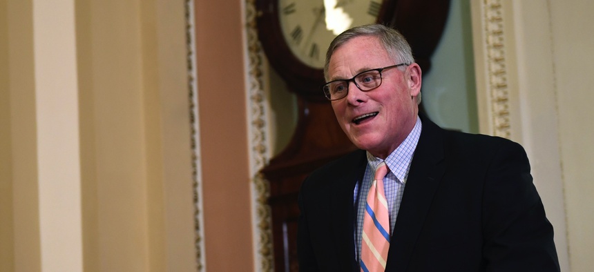 Sen. Richard Burr, R-N.C., walks on Capitol Hill in Washington, Monday, Feb. 3, 2020.