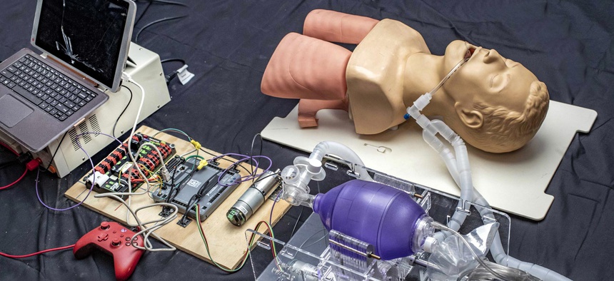 THIS SHOWS THE SETUP USED FOR PRELIMINARY TESTING OF AN EARLIER VERSION OF THE LOW-COST PROTOTYPE DESIGN THAT COULD PROVIDE RAPID DEPLOYMENT TO HOSPITALS FACING SHORTAGES OF THE VITAL EQUIPMENT.