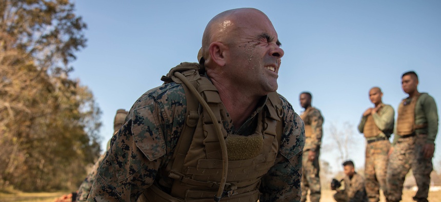 Staff Sgt. Matthew Driggers, fleet readiness center senior enlisted advisor with Marine Light Attack Helicopter Squadron 773, Marine Aircraft Group 49, executes a pushup during Martial Arts Instructor Course 1-20 aboard Naval Air Station Joint Reserve Bas