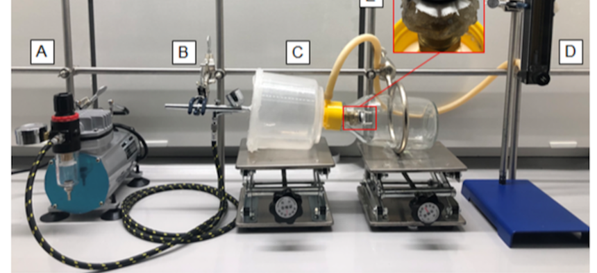 An apparatus to test different materials for COVID-19 protection by Army research engineers.